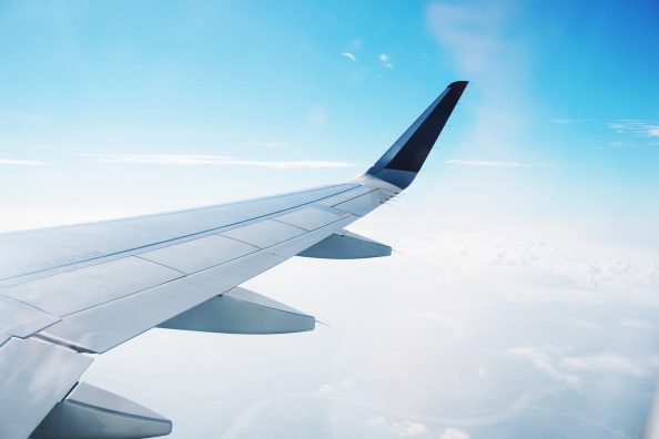 Aircraft wing with turbines in the air.