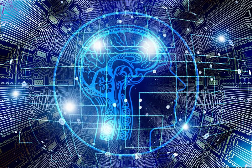 Human skull with brain and skeleton in front of hard disk pattern.