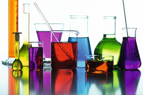 Test tubes with different coloured liquids.