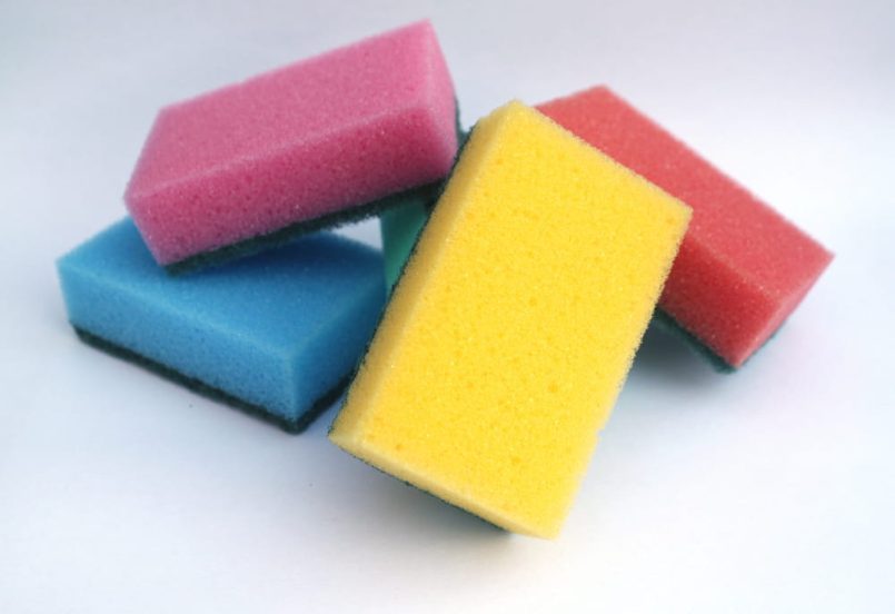 Colourful cleaning sponges on a heap.