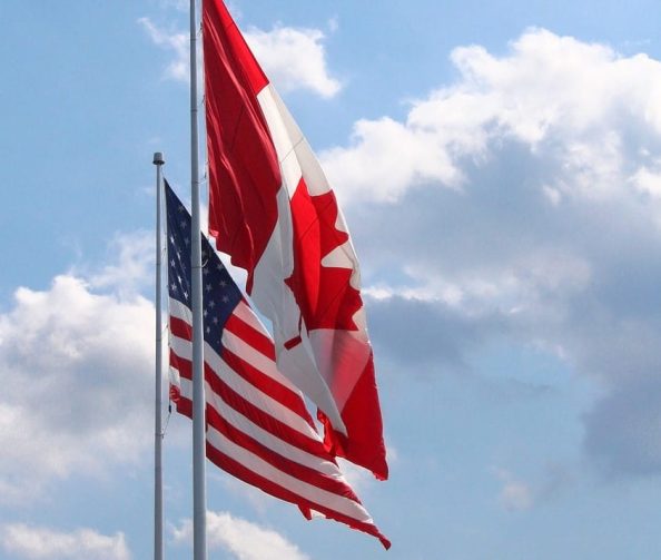 The US and Canadian flags.