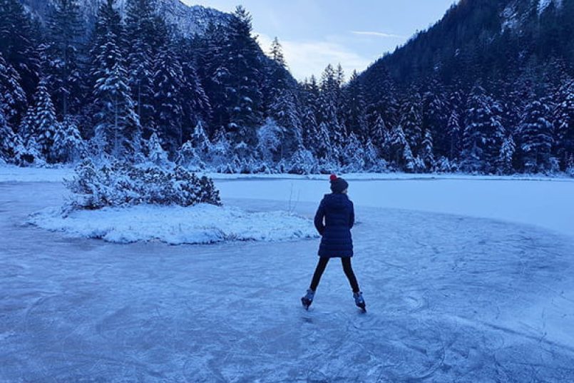 A skater in a wintry landscape as a symbolic image.