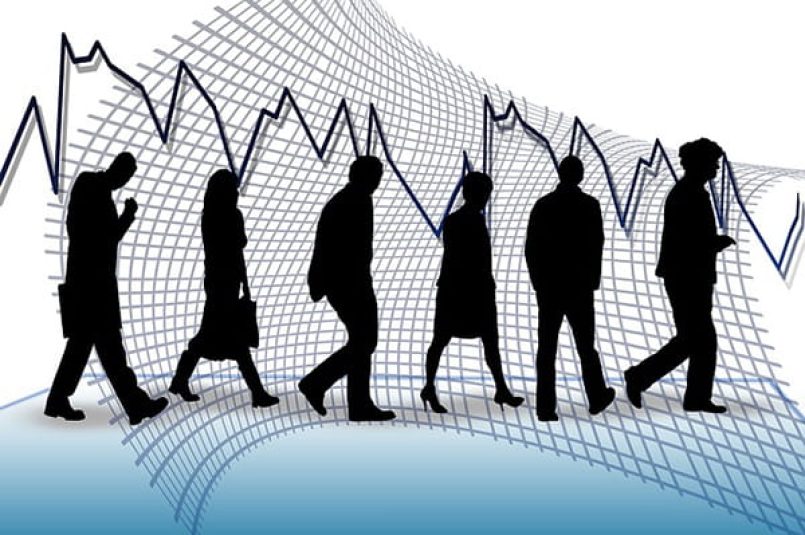 A graphic shows silhouettes of people in front of an economic balance sheet.