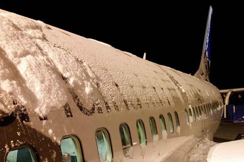 A snow-covered aircraft.