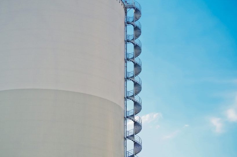 A silo with external stairs as a symbolic image.