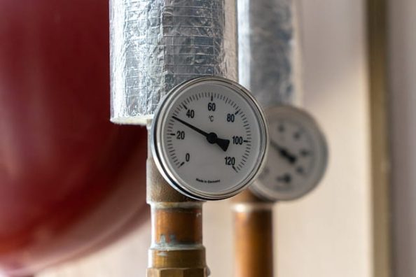 A heating pipe with thermometer.