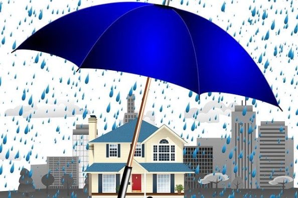 Graphic: Buildings in the rain with an umbrella as symbol.