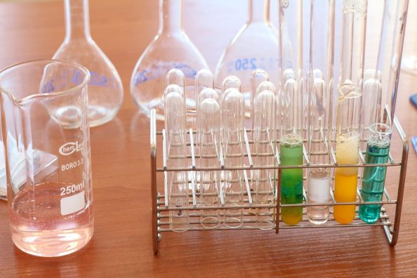 Different test tubes in a laboratory as a symbol.