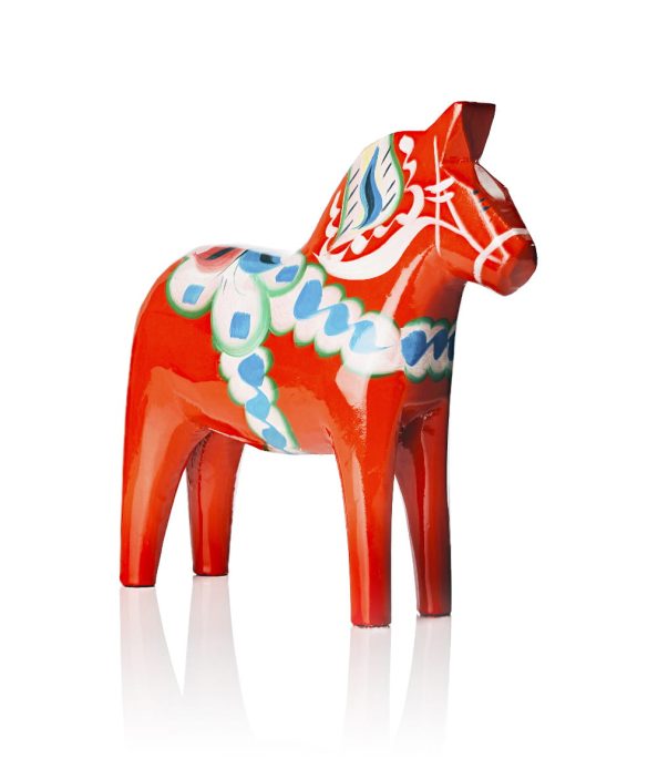 Red wooden horse with blue-white pattern.