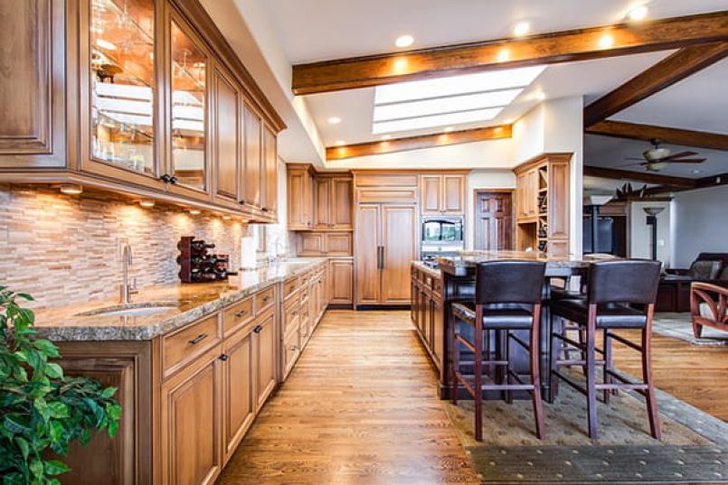 A kitchen with wooden cupboards