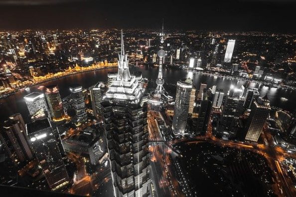 An aerial view of Shanghai by night as a symbol.