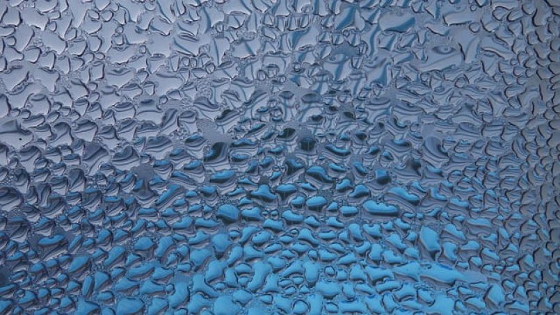 Water drops on a surface as a symbol.