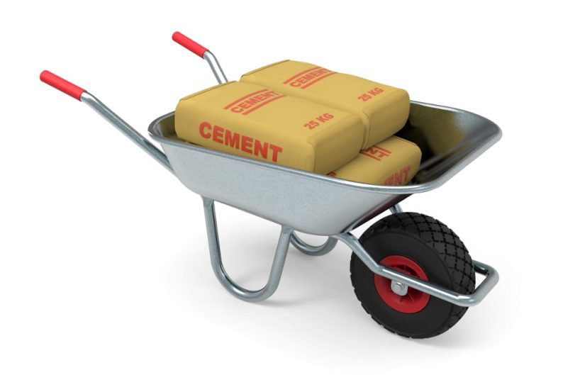 Cement bags in a wheelbarrow.