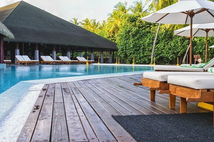 A wooden terrace and wooden terrace furniture.