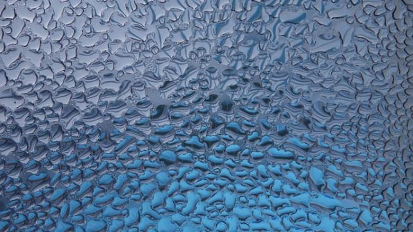 A glass plate with drops of water as symbol.