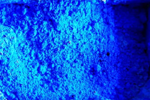 Blue pigment powder as a symbol image.