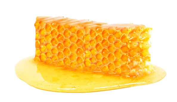 Golden honeycomb from which honey flows.