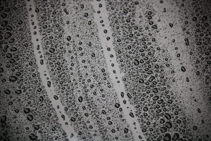 Drops on a metal surface as a symbol.