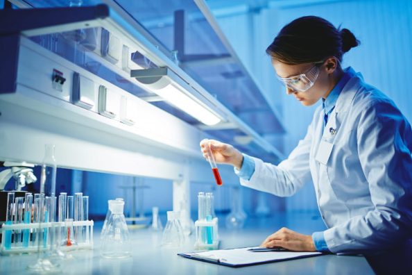 A chemist in a laboratory as a symbolic image.