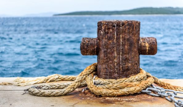 Boat pier with mooring and rope.