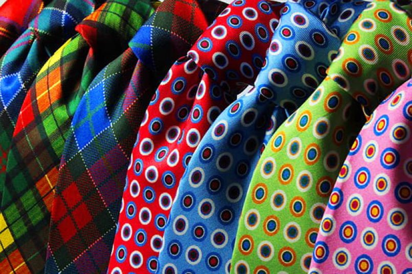 Colourful printed ties as a symbolic image.