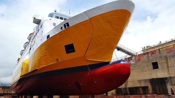 A hull in dry dock as a symbol.