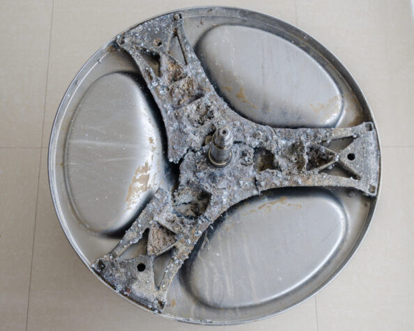 Corroded aluminium spider of a washing machine. Protection is vital to prolong lifetime of parts like this.